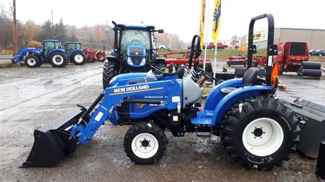 auxiliary attatchment on new holland skid steer|new holland workmaster 25 attachments.